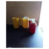 4 VINTAGE PLASTIC PITCHERS