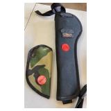 1 GUN HOLSTER AND 1 LNOFE HOLDEE