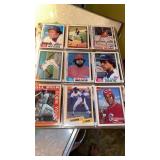 BINDER FULL OF BASEBALL CARDS ABOUT 200 OF THEM