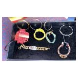 9 ASSORTMENT OF BRACELETS