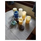 2 SMALL PLASTIC BINS WITH CANDLES