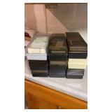 9 CASES OF CASSETTES  MANY OF CONTAINERS ARE FROM