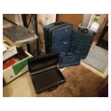 LEISURE SUITCASE SET AND A BRIEF CASE