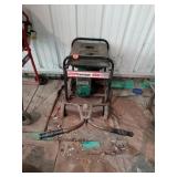 GENERATOR ON A LAWN MOWER BASE FOR TRANSPORT,