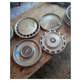 4 UNMATCHED HUB CAPS