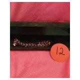 GOLD COLORED WOMENS BRACELET, HEARTS, STAMPED AE