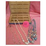 3 COSTUME JEWELRY NECKLACES IN A JEWELRY CASE