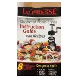 LePRESSE FOOD CUTTER LOOKS TO BE NEW