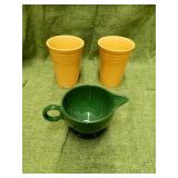 2 YELLOW FIESTAWARE GLASSES, HAS CHIP AND GREEN