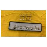 8 GOLD PLATED SKI CHARMS AND STERLING SILVER