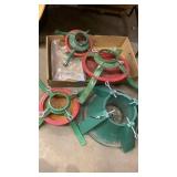 4 CHRISTMAS TREE HOLDERS