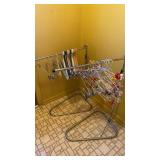 2 CLOTHING RACKS WITH HANGERS