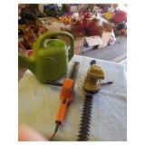 2 HEDGE TRMMERS AND A PLAST WATER CAN