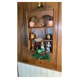 SHELVING ON WALL WITH FIGURINES BRASS BELL ANS