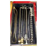 6 LONG NECKLACES  1 GOLD