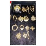 GOLDEN PINS AND NECKLACE ORNAMENTS