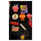 8 PINS KEY CHAIN  INCLUDING NEBRASKA AND FAIRBURY