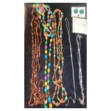 EARRINGS AND SHOWY LONG NECKLACES