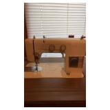 VINTAGE MONTOMERY WARD SEWING MACHINE IN STAND