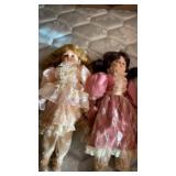 2 DOLLS WITH STANDS