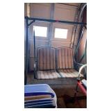 OUTSIDE SWINGING GLIDER