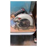 SKIL SAW 7 1/4IN WITH BLADES