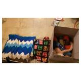 2 AFGHANS , BIBLE AND MANY ROLL OF  YARN