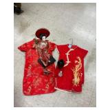 Two Dresses and Figurines