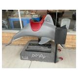 Coin-Operated Dolphin Ride