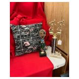 Trophies and Throw Pillows