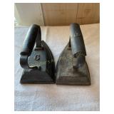 2 cast iron Sad irons, one has a #6 on it, show