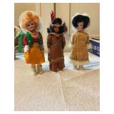 3 Celluloid dolls w/ traditional clothing,