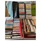 40+ cassette tapes in cases, country mostly