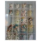 Glass pearlized beads in case