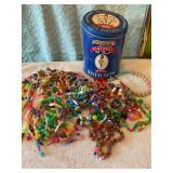 1973 Mardi Gras beads in planters can