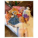 Misc dolls, clock, porcelain musical doll, etc