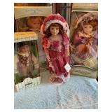 4 porcelain dolls 17' tallest