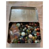 Tin of marbles, cat eyes, shooters, etc. 200+
