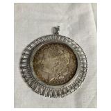 1884 Morgan silver dollar W/chrome frame