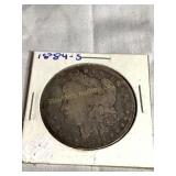1884 (s) Morgan silver dollar