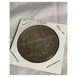 1904 Morgan silver dollar