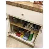 Contents of cupboard- vases, iron, laundry