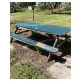 Wood picnic table 8 ft, shows wear