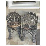 2 cast iron chairs 24' high, shows wear wear
