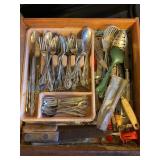 Contents of drawer, silverware, butcher knives,