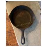 Puritan 8 iron skillet marked 5 E, shows wear