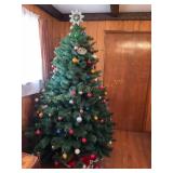 8 ft lighted tree, not tested w/ bulbs