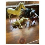 5 horse figurines 10' x 10' tallest, plastic and