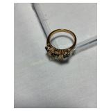 Gold?, no markings, glass stones?non magnetic,