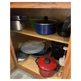 Contents of 1 cabinet- pots,pans,skillet,deep